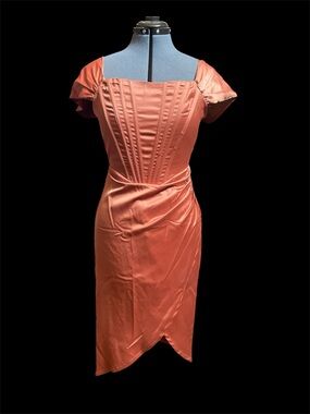 Stunning rust vintage inspired cocktail dress.